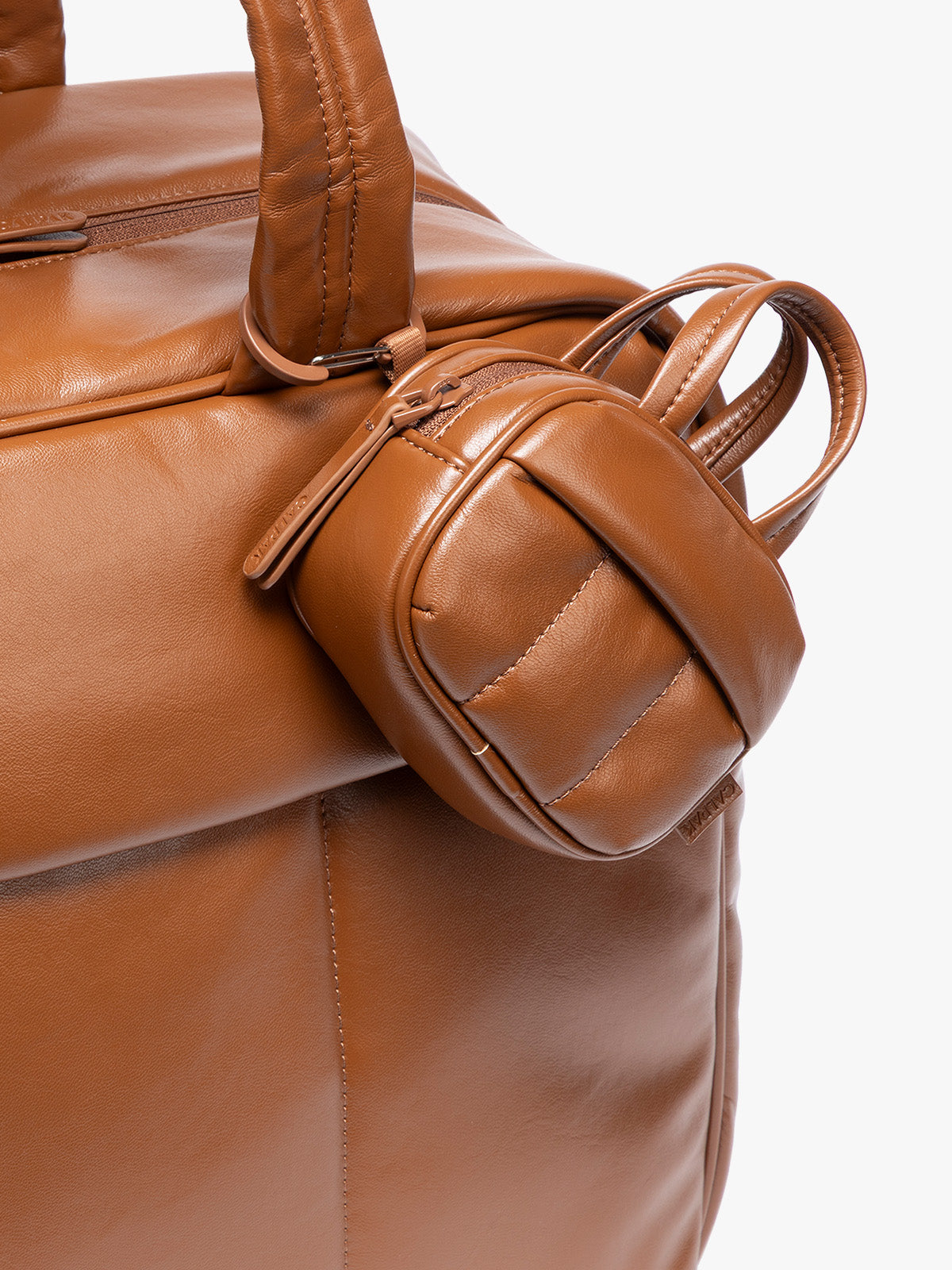 ALK2501_LUKA_DUFFEL-KEY-POUCH_HONEYBROWNPU_2.jpg