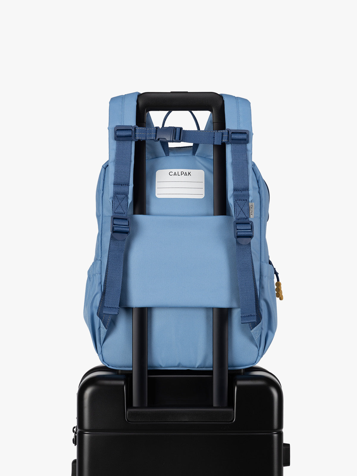 CKBM2501_KIDS_MEDIUM-BACKPACK_BLUE_TROLLEYSLEEVE.jpg
