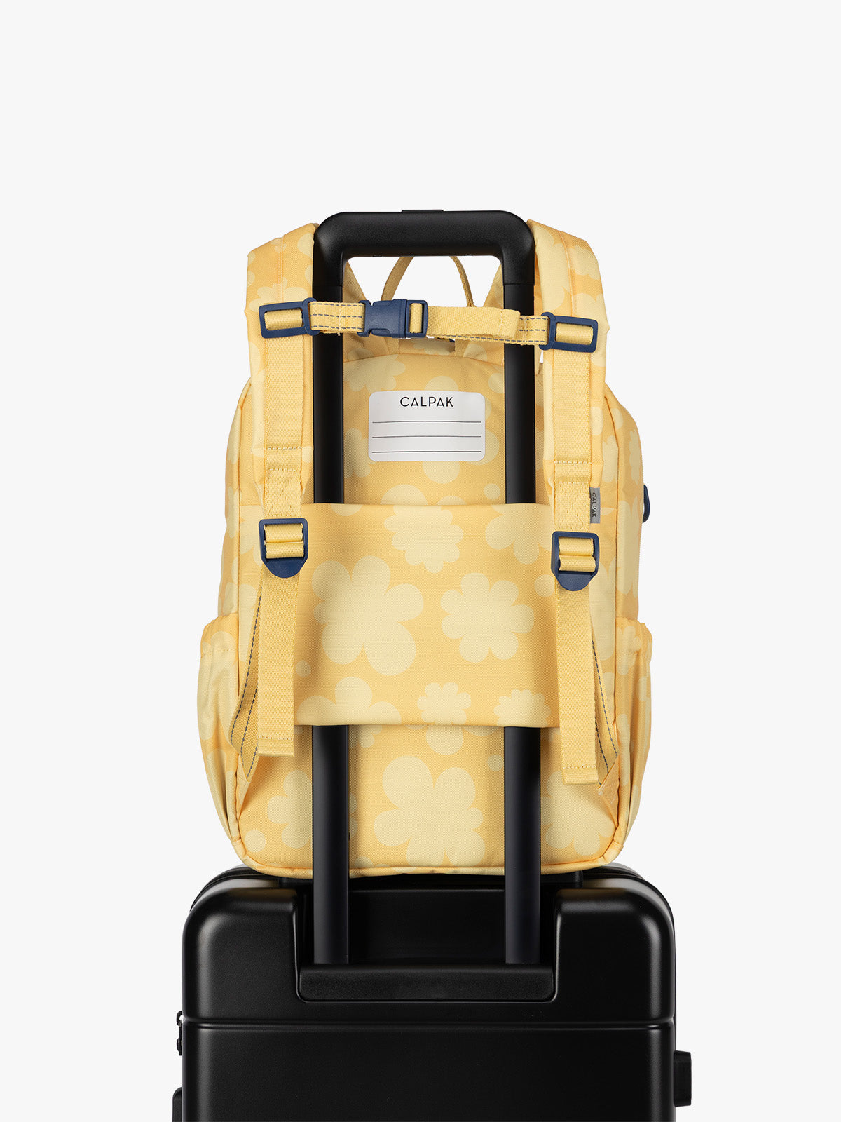 CKBM2501_KIDS_MEDIUM-BACKPACK_YELLOW-BLOOM__TROLLEYSLEEVE.jpg