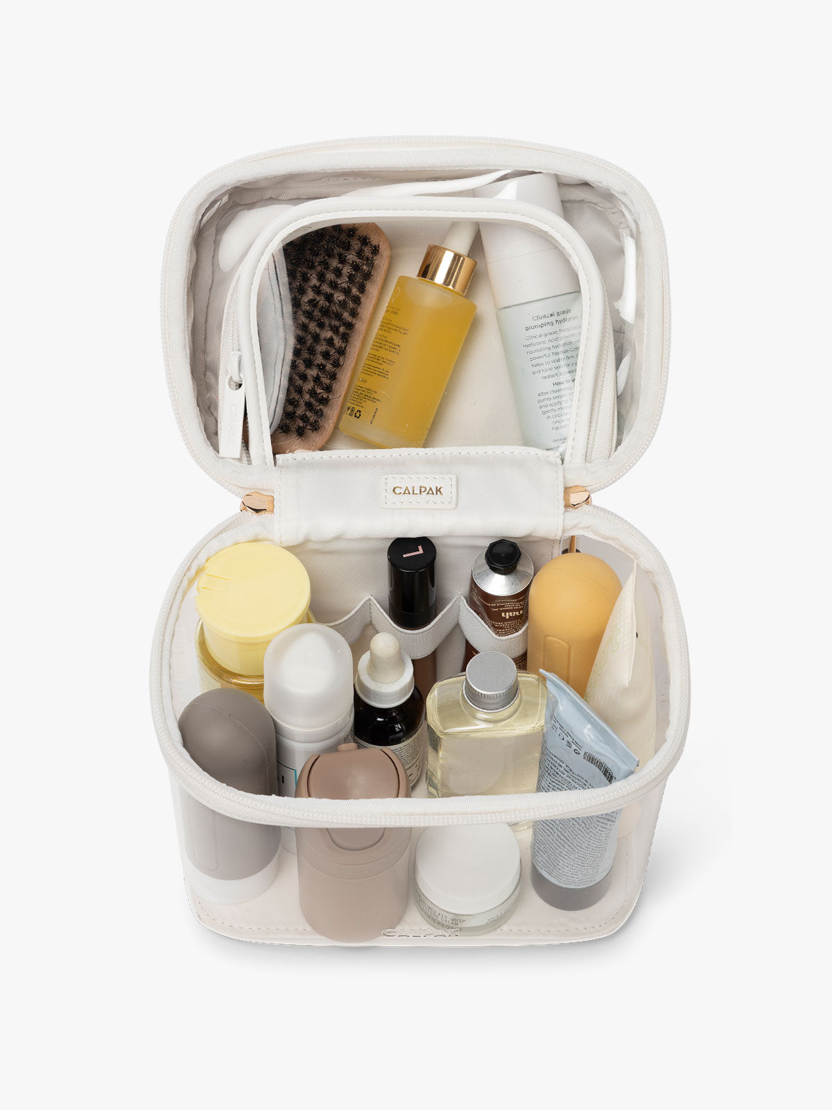 CLEAR-TRAIN-CASE-PACKED-WHITE.jpg