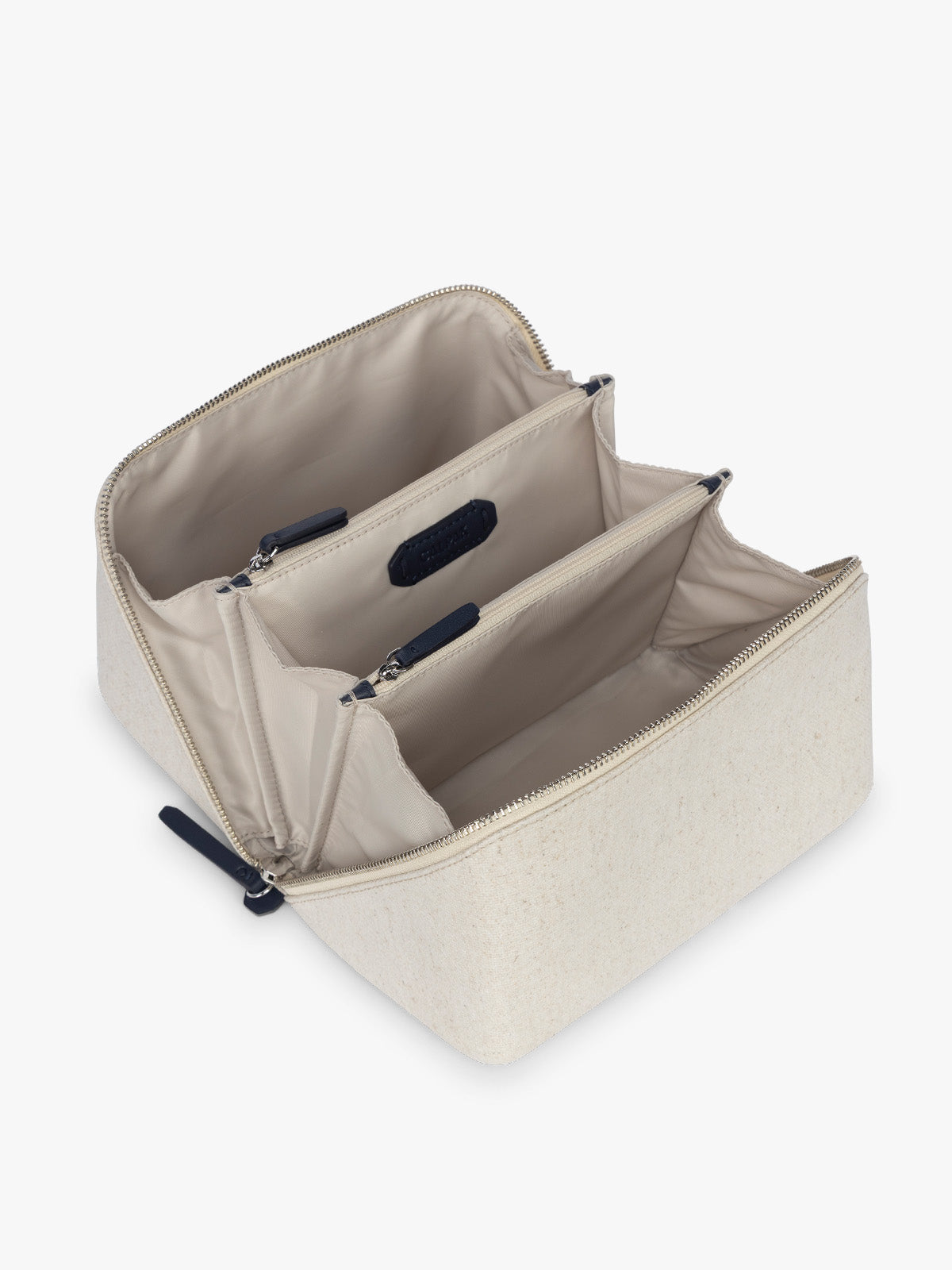 CLTB2601_COLETTE_LAY-FLAT-CANVAS-TOILETRY-BAG_NATURALNAVY_3.jpg