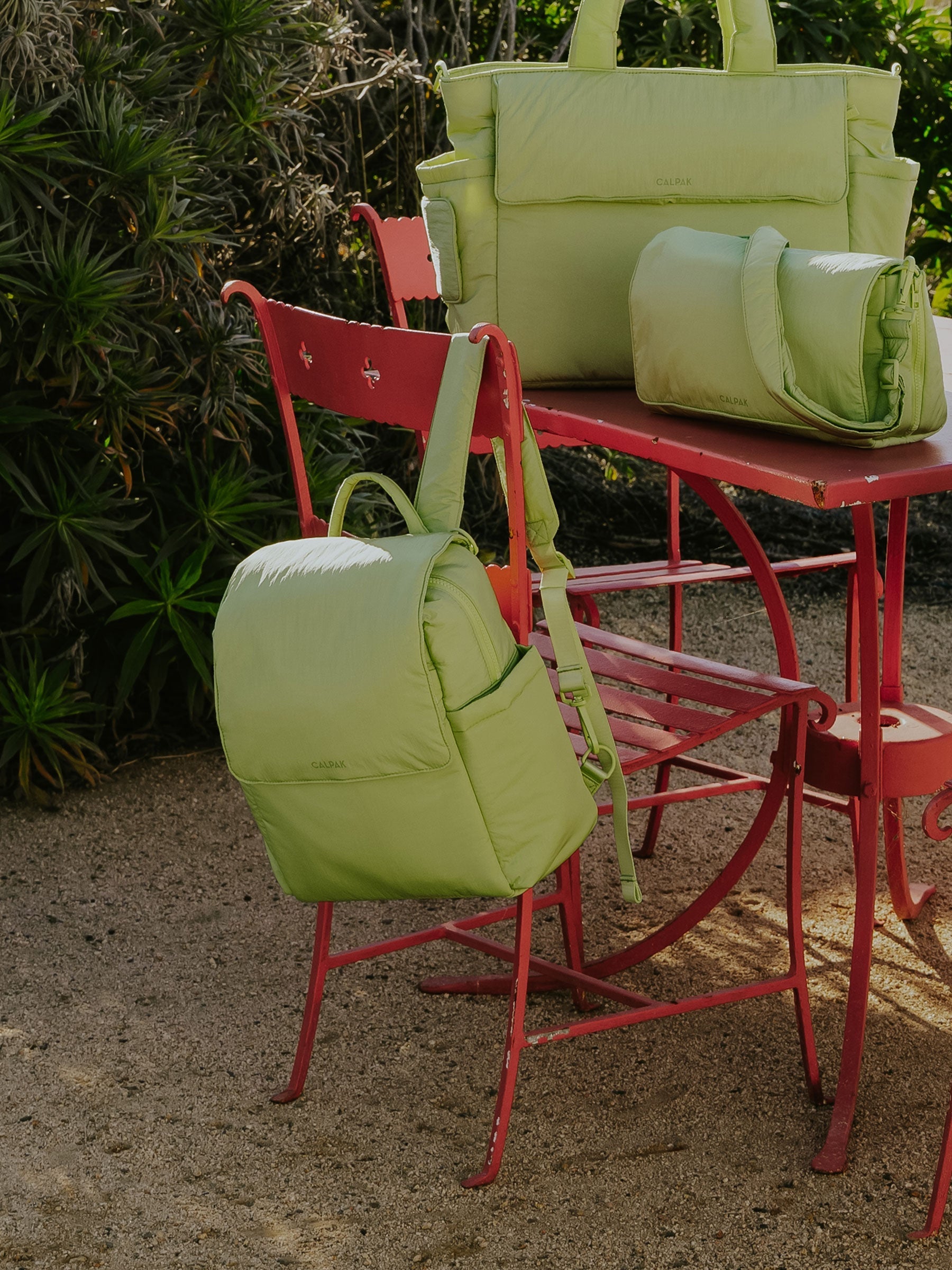CONVERTIBLE-MINI-DIAPER-BACKPACK-LIME-LIFESTYLE1_22063cc5-b9a0-4d34-9eb3-5aff550a1da5.jpg