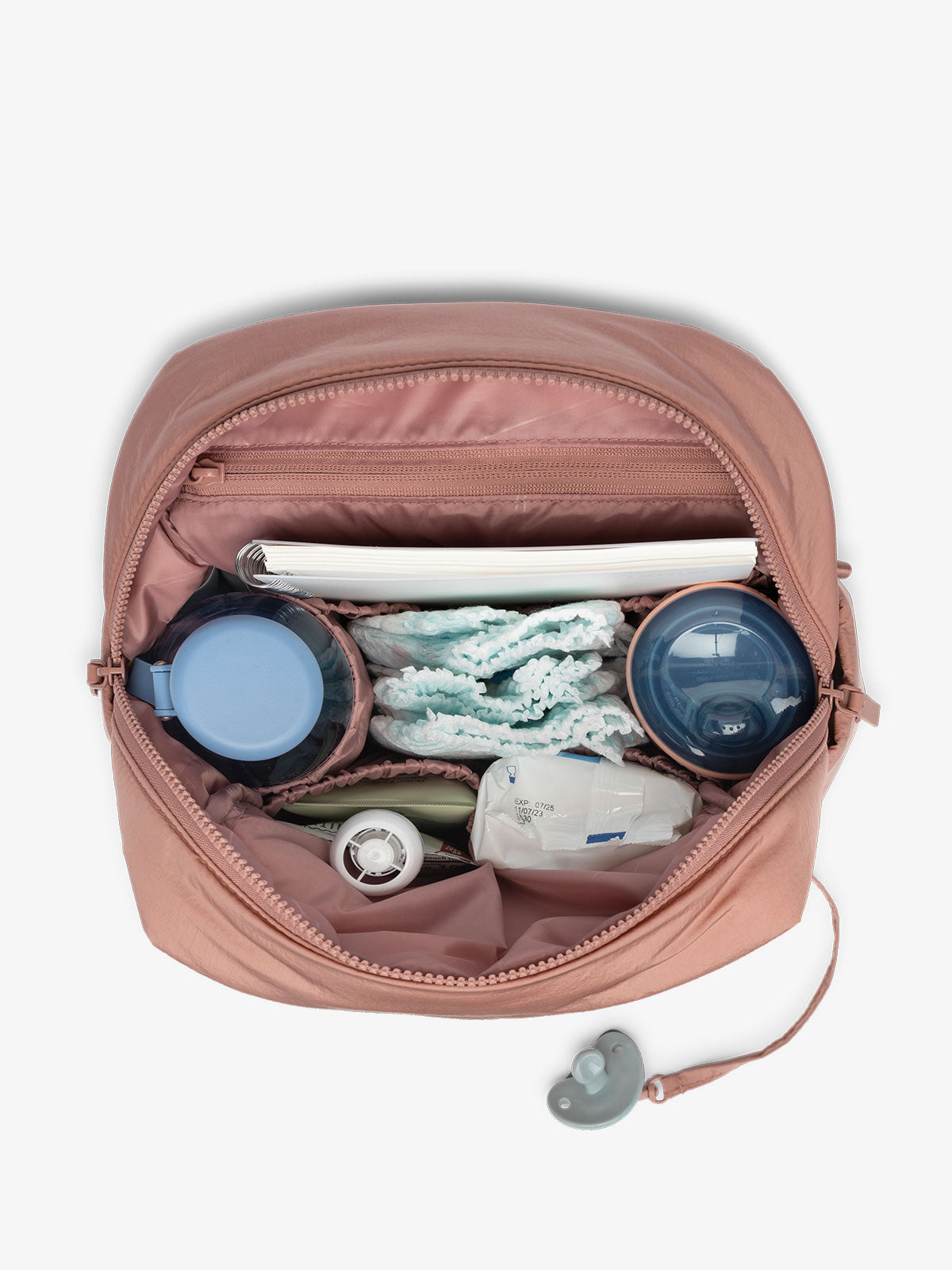 CONVERTIBLE-MINI-DIAPER-BACKPACK-PEONY-INTERIOR_3715474c-5f47-47e8-b42e-6d125a8b1a4e.jpg