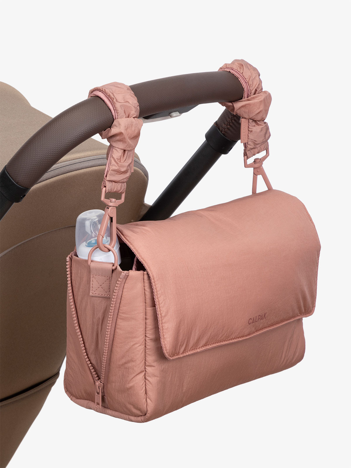 CONVERTIBLE-STROLLER-CADDY-CROSSBODY-PEONY-STROLLER-STRAP_95a50537-bf00-4774-8225-c0b51cf776e0.jpg