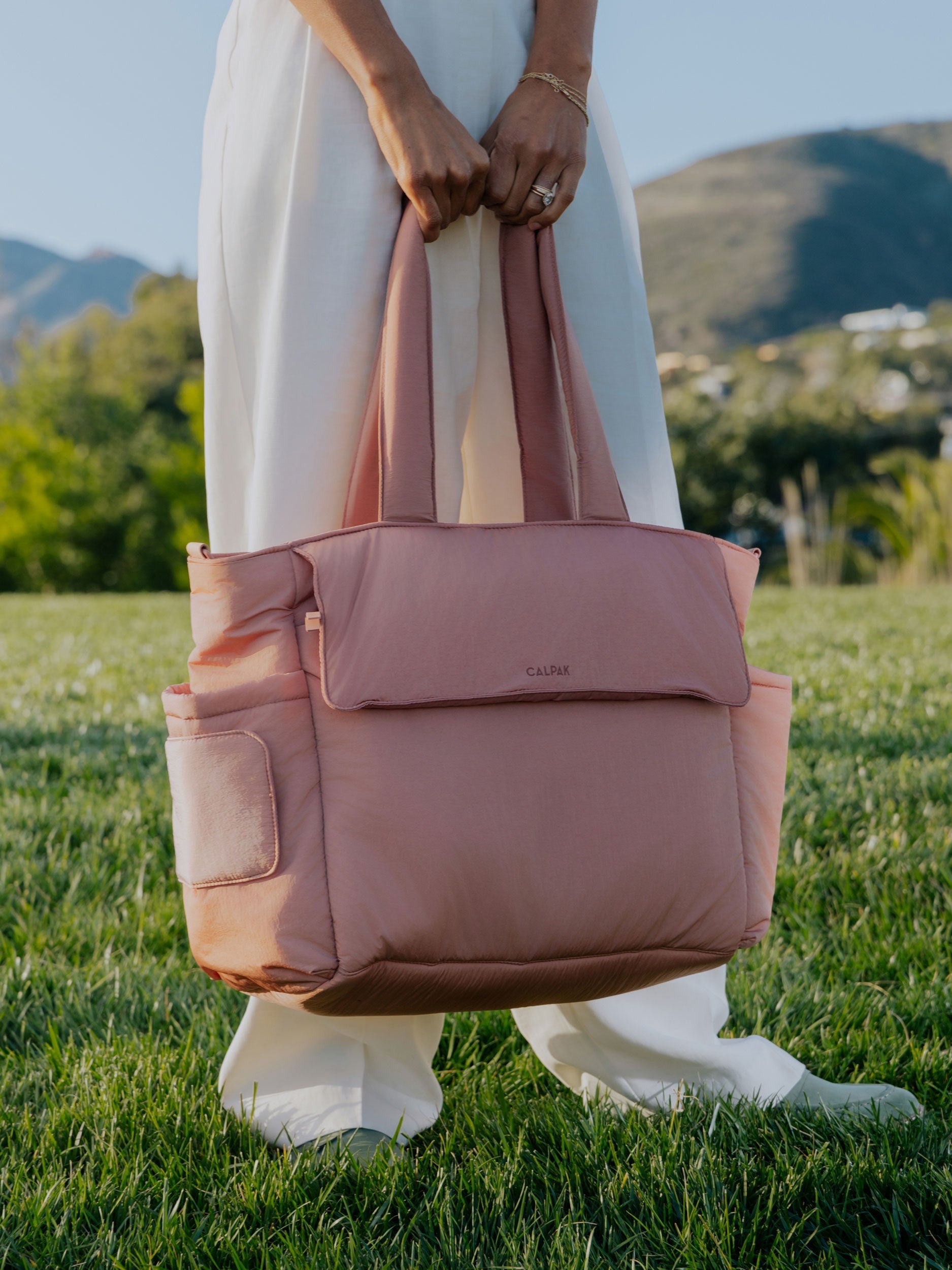 DIAPER-TOTE-BAG-WITH-LAPTOP-SLEEVE-PEONY-LIFESTYEL1_17764d28-a228-4a79-a83f-19feac102a63.jpg