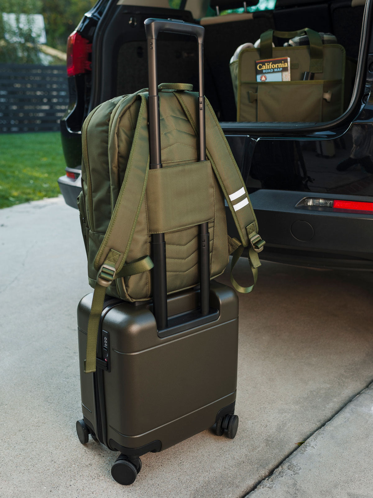 HUE-MINI-CARRY-ON-LUGGAGE-MOSS-LIFESTYLE-1_3095436f-f38b-43ec-b235-51cea6bc920a.jpg