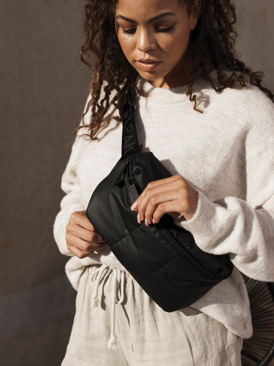 LUKA-MATTE-BELT-BAG-BLACK-LIFESTYLE1_dc8e9439-4f1d-4ad1-ac2c-d6eb06c220ad.jpg