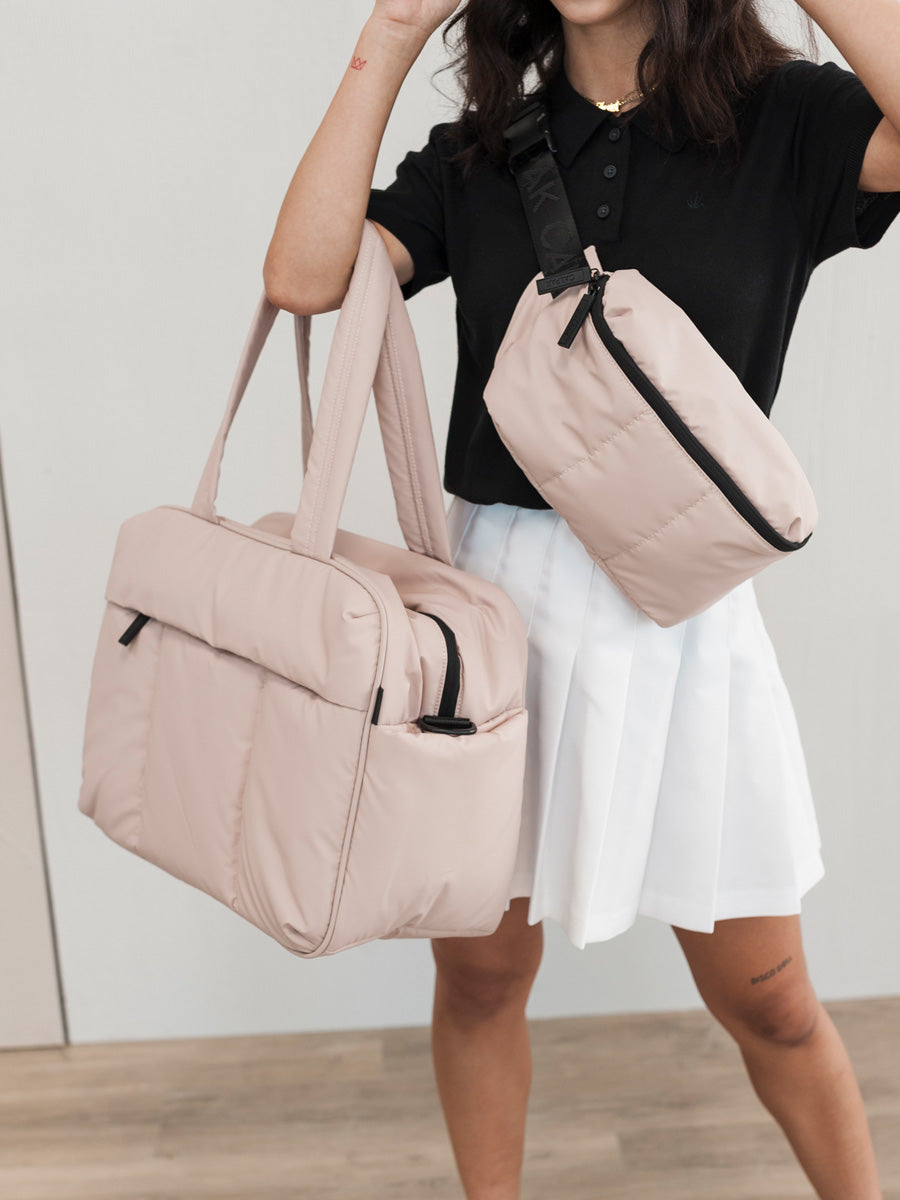 LUKA-MATTE-BELT-BAG-ROSE-QUARTZ-LIFESTYLE2_29f31360-2cf4-42e1-9e72-58492360df3f.jpg