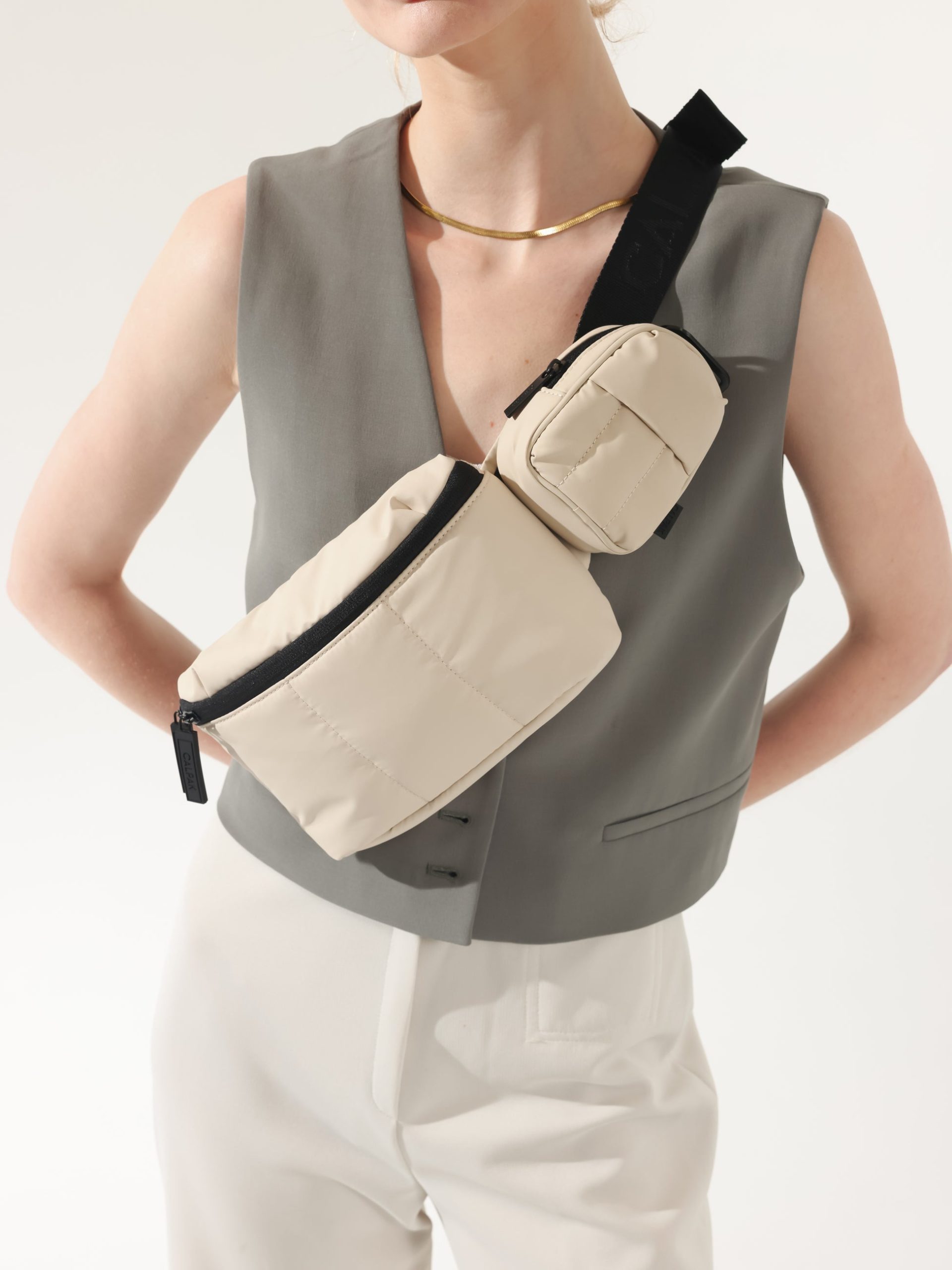 LUKA-MINI-BELT-BAG_OATMEAL-LIFESTYLE1_d37e11a4-2695-49ab-bd59-58316fd73ab3.jpg