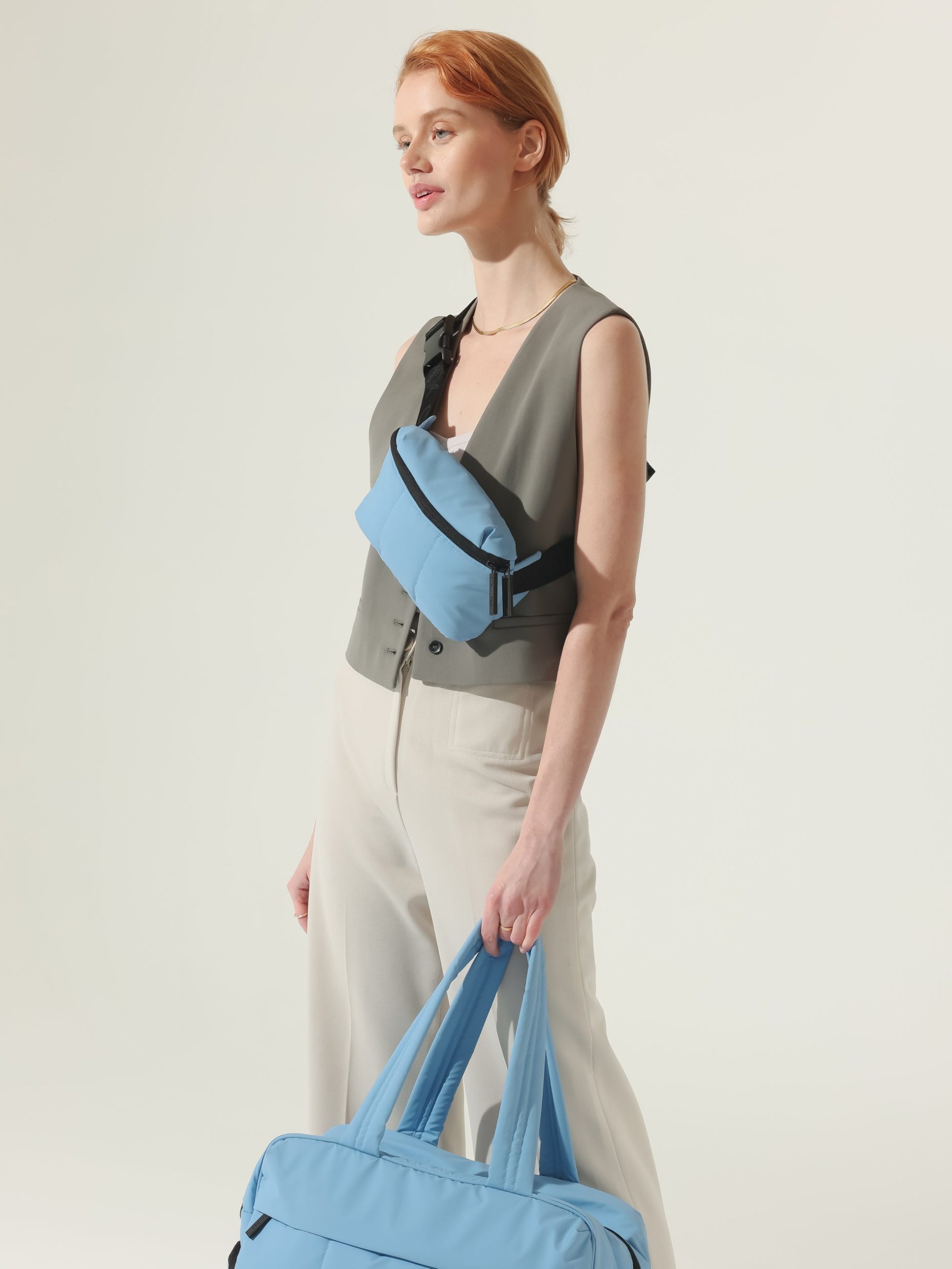LUKA-MINI-BELT-BAG_WINTER-SKY-LIFESTYLE1_cb6df53c-5770-4395-bc34-af7fd27aa3b2.jpg