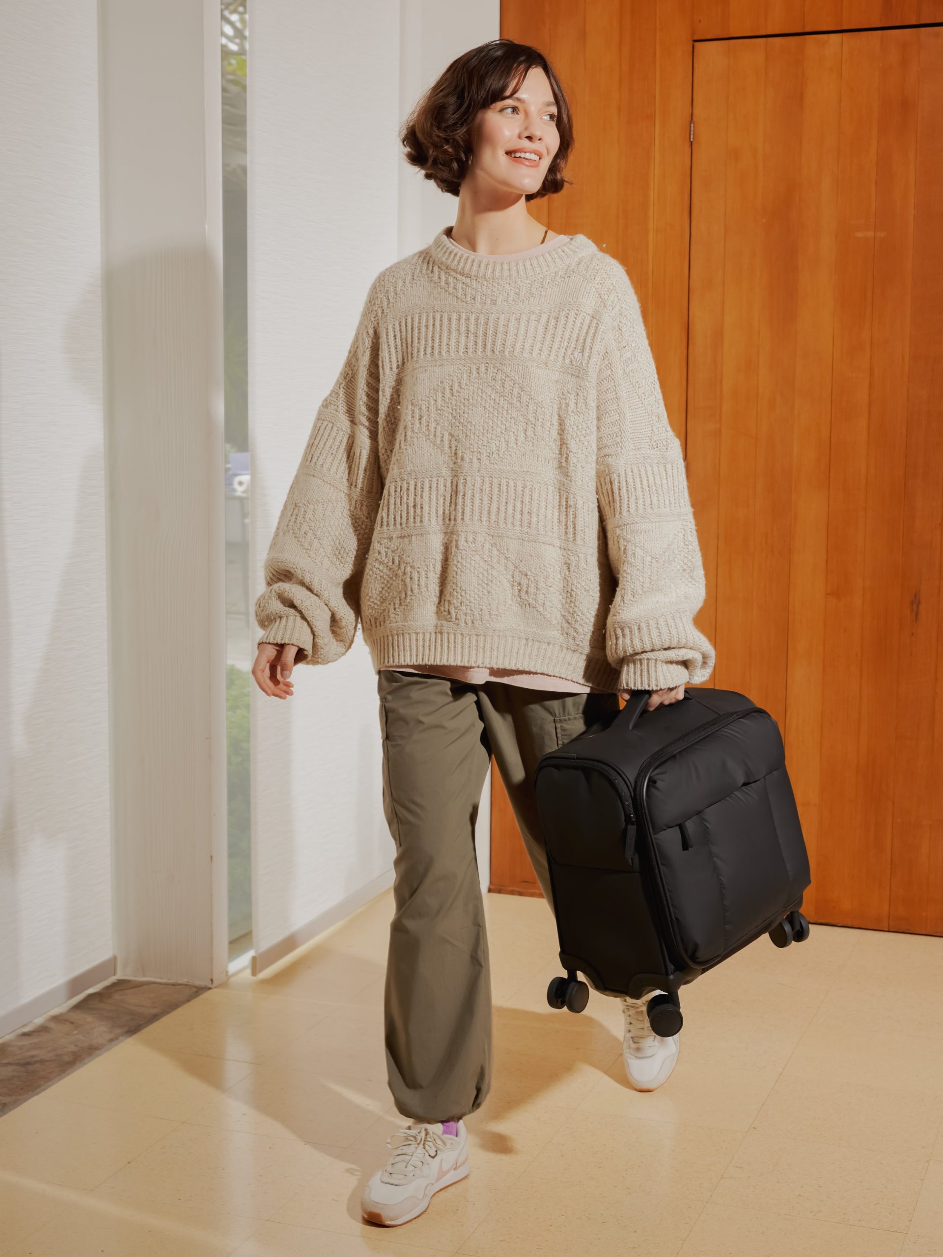 LUKA-MINI-CARRY-ON-LUGGAGE-BLACK-LIFESTYLE2_7afeb9b1-b631-4c33-8450-d282e9cd97d4.jpg