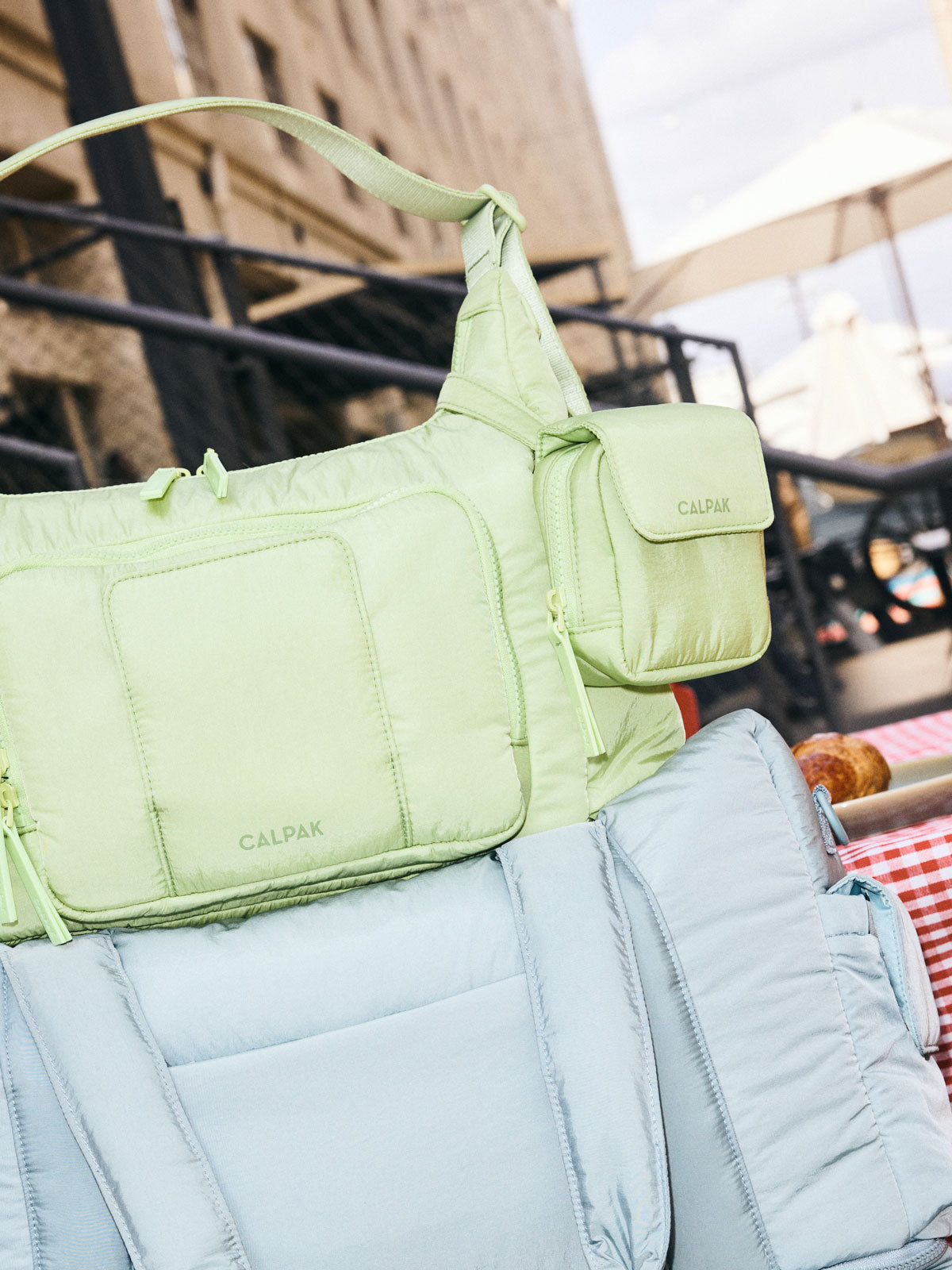 PCB2501_PACIFIER-POUCH_LIME-LIFESTYLE.jpg
