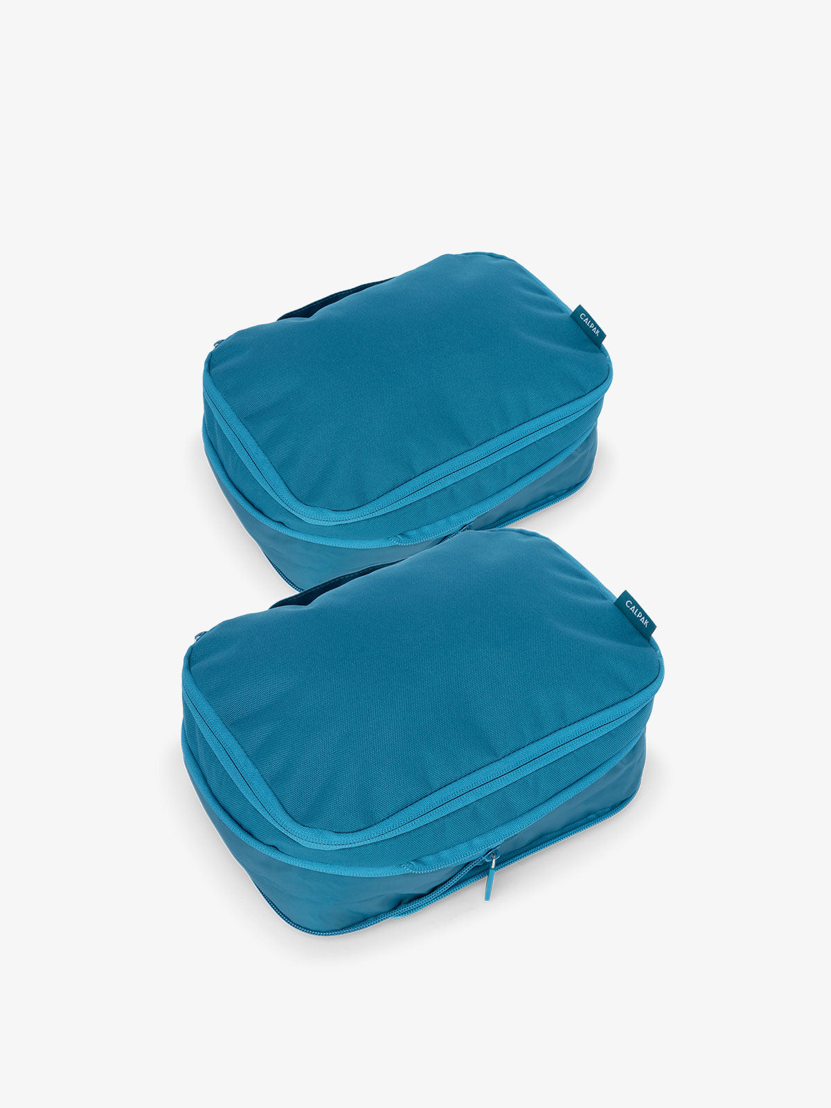SMALL-COMPRESSION-PACKING-CUBES-2-PIECE-SET-EXPANDED-LAGOON_cb7dd678-37d4-430e-bc36-43f8f9ef9ade.jpg