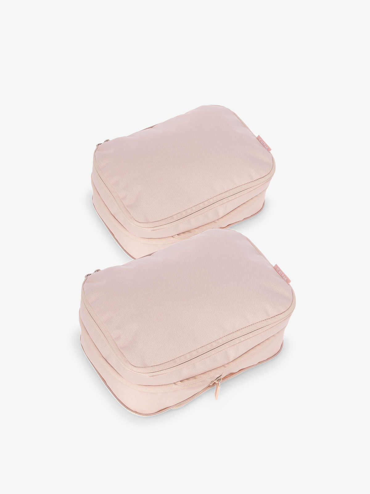 SMALL-COMPRESSION-PACKING-CUBES-2-PIECE-SET-EXPANDED-PINK-SAND_c54e5609-a074-42ad-a42a-5fd14bb3a969.jpg