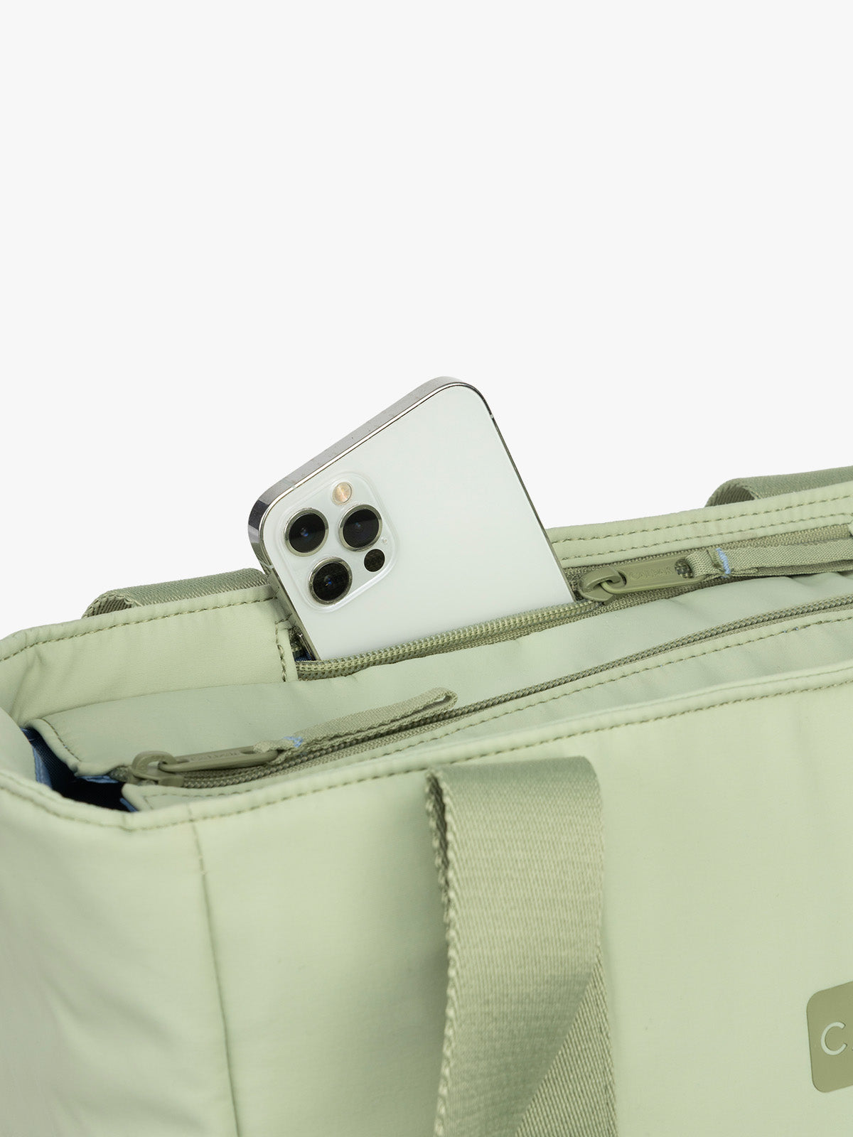 TCN2501_CONNECT_ZIPPERED-LAPTOP-TOTE_MEADOW_PHONE-POCKET.jpg