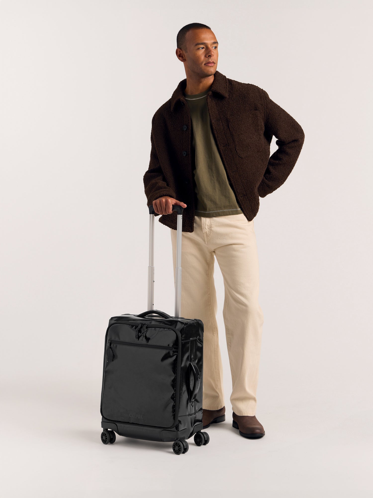 TERRA-35L-SOFT-SIDED-CARRY-ON-LUGGAGE-OBSIDIAN-LIFESTYLE1_3cca39e9-3c9c-443a-bae3-6703b3de64e8.jpg