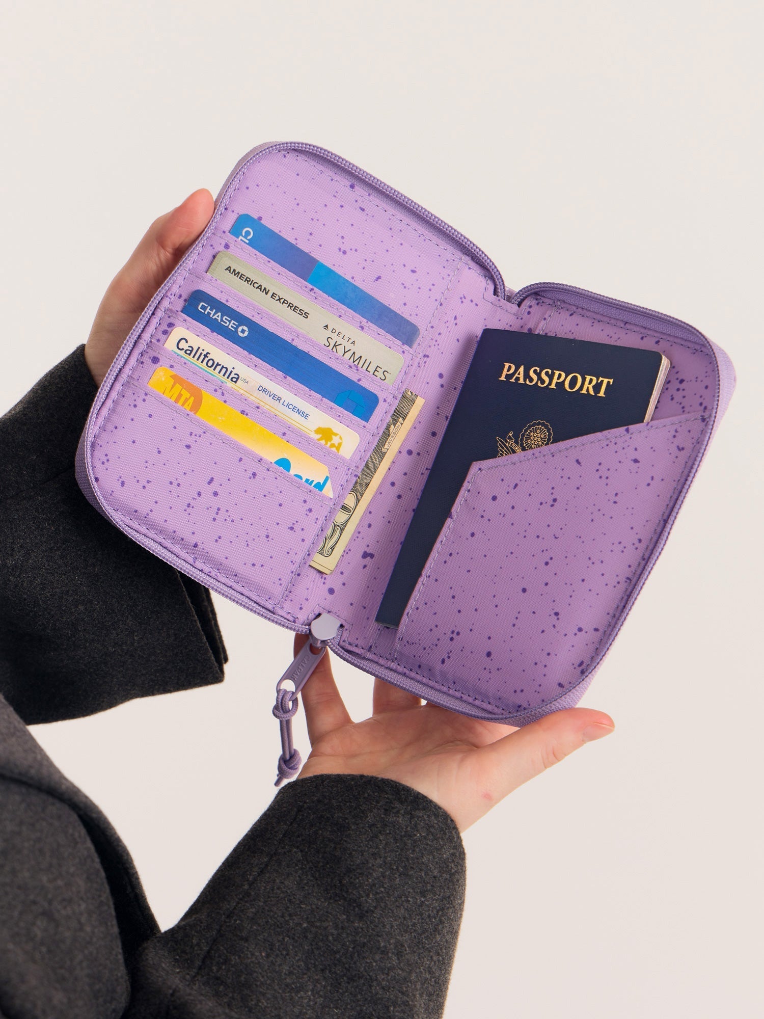 TERRA-ZIPPERED-PASSPORT-WALLET-AMETHYST-LIFESTYLE1_30b52234-1892-4a6d-88e6-8d55a00e906b.jpg
