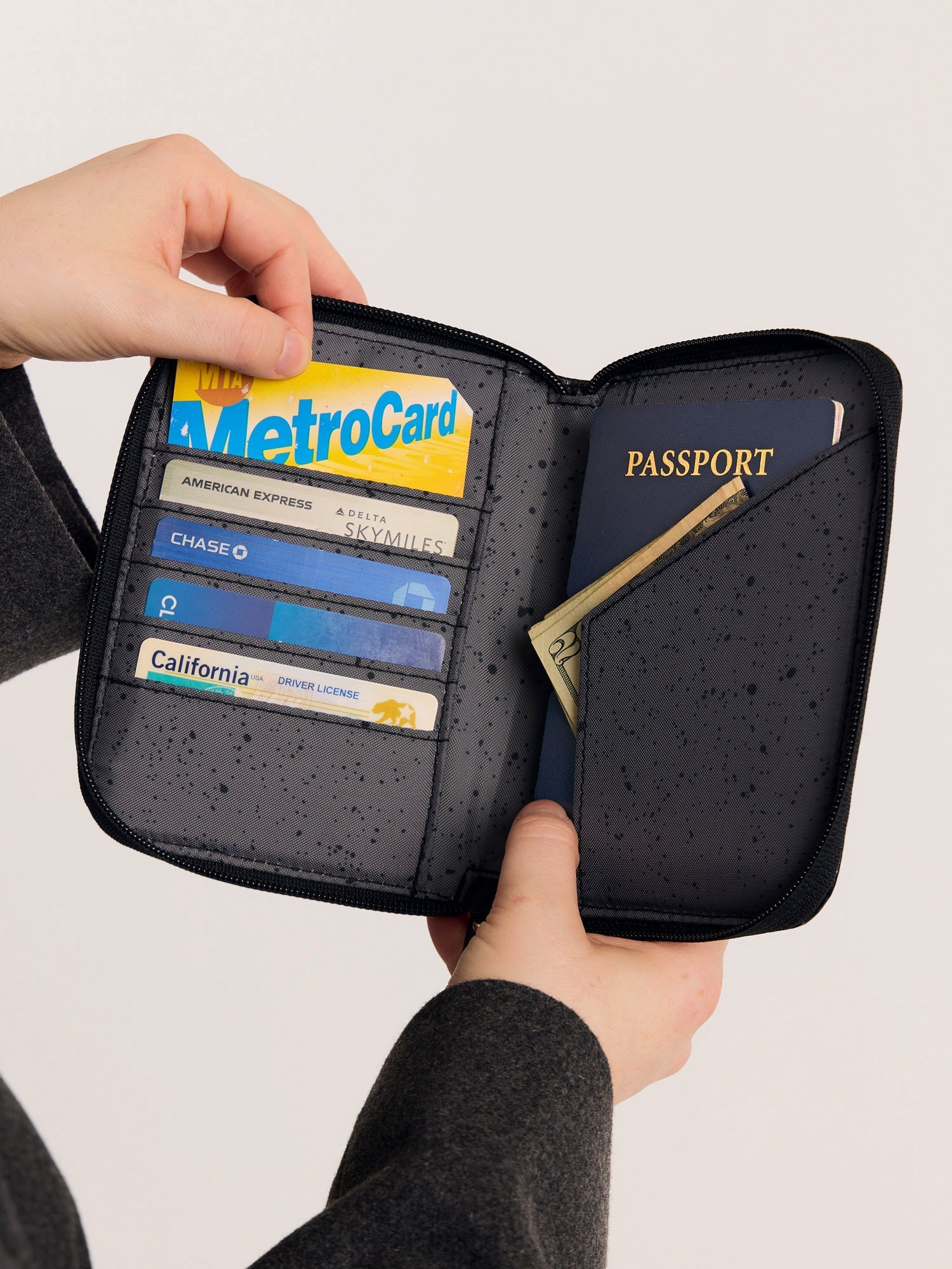 TERRA-ZIPPERED-PASSPORT-WALLET-OBSIDIAN-LIFESTYLE1.jpg