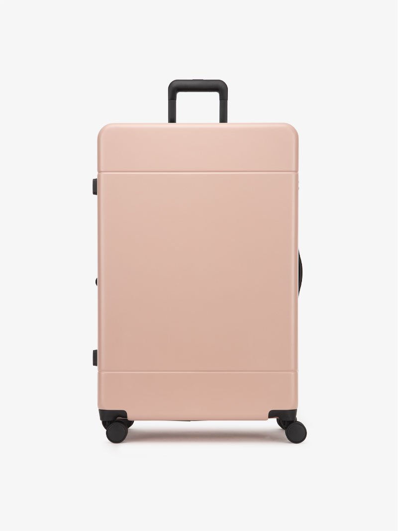 hue-large-luggage-pink-sand-front_8453e393-3941-4cf9-a552-701782482548.jpg